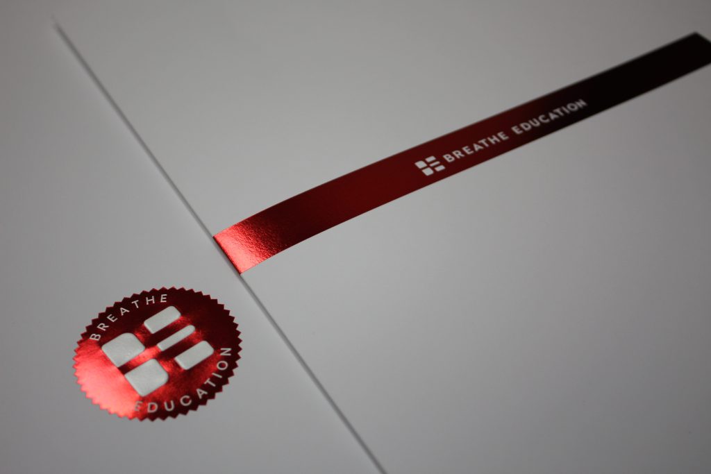 foil stamping vs embossing design